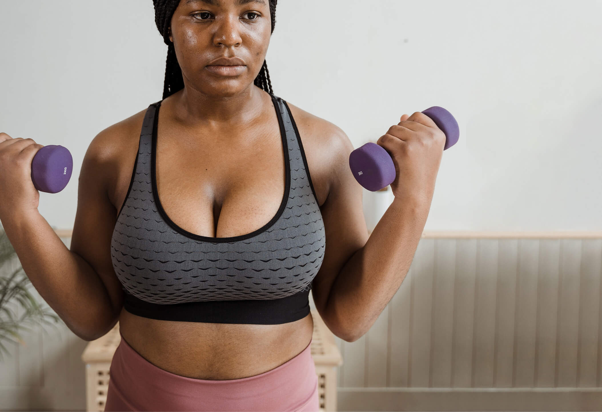 Close-up Onhand Holding Big Boobs In A Sport Bra In Sexual Erotic