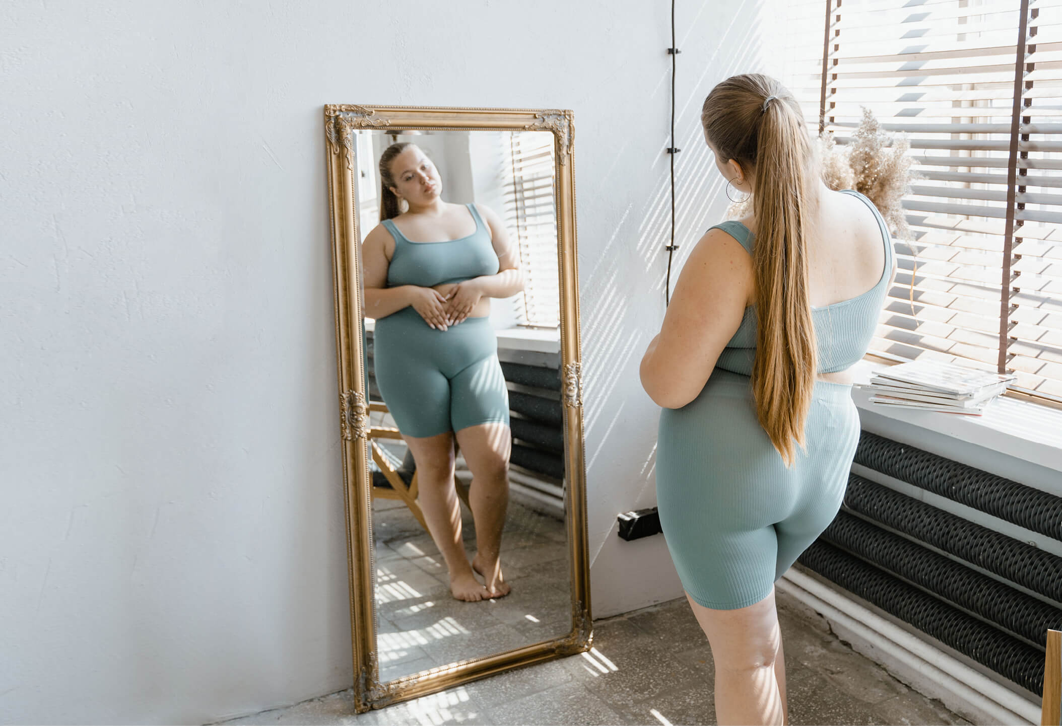 woman looking in mirror 1